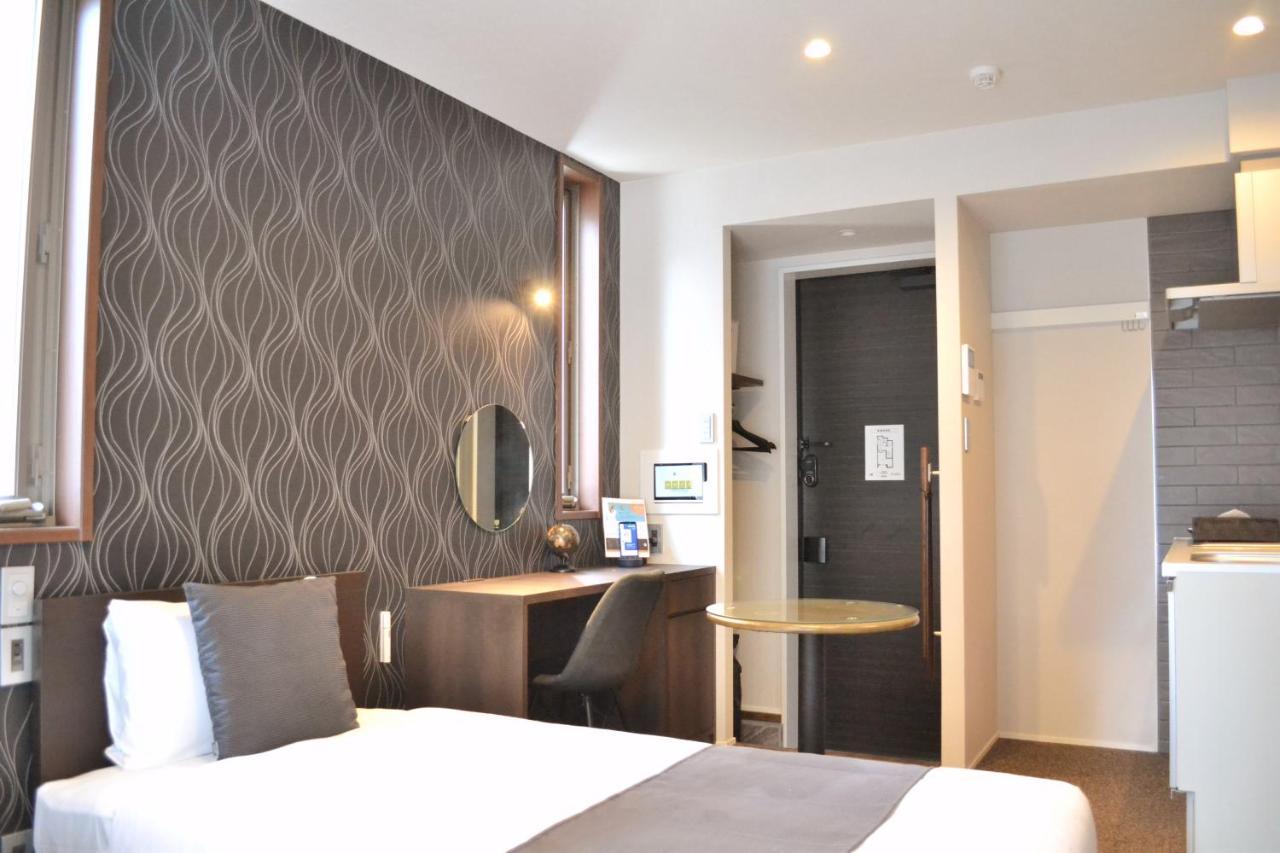 แกรนด์ เบส เทนจิง Aparthotel ฟูกุโอกะ ภายนอก รูปภาพ