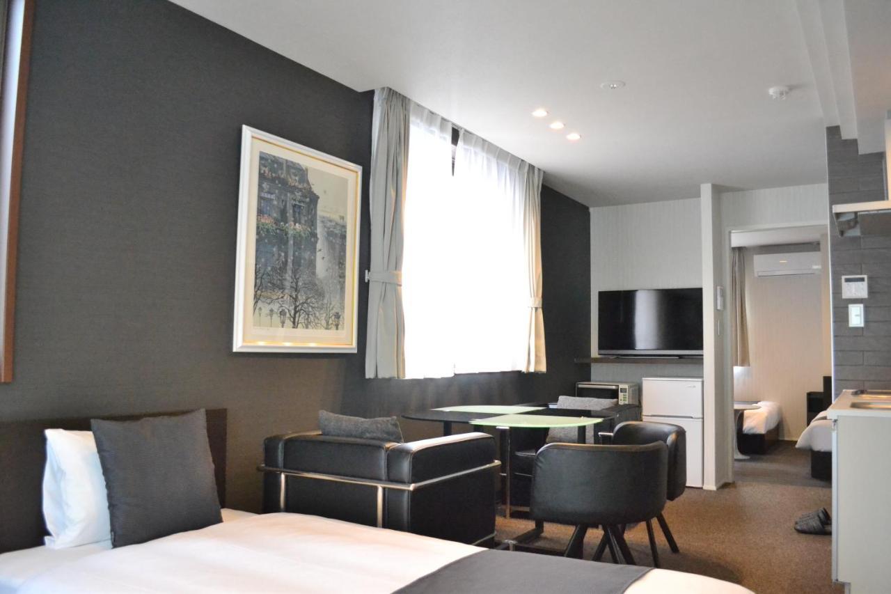 แกรนด์ เบส เทนจิง Aparthotel ฟูกุโอกะ ภายนอก รูปภาพ