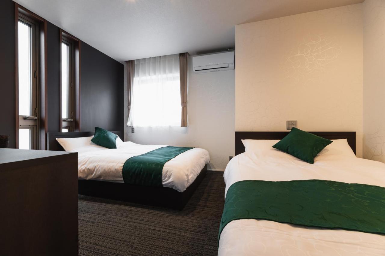 แกรนด์ เบส เทนจิง Aparthotel ฟูกุโอกะ ภายนอก รูปภาพ